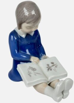 Girl Reading First Book