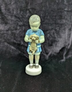 Boy Holding Puppy