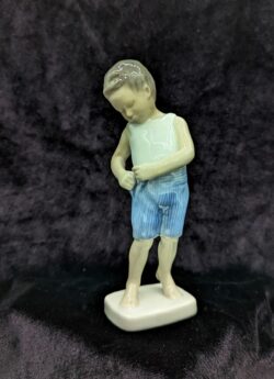 Toddler Boy Buttoning Up Trousers